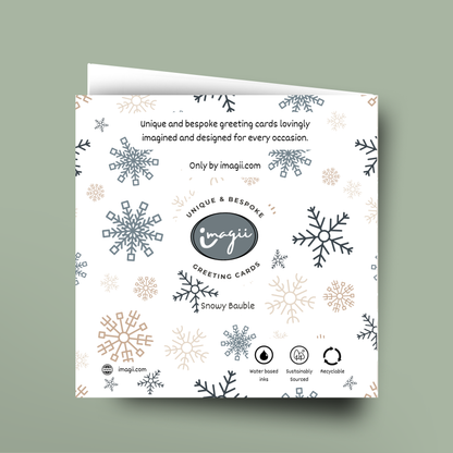 Greeting card with snowflake design and imagii branding on a light green background
