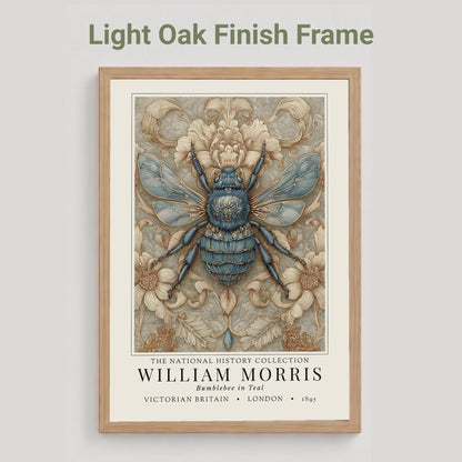 A framed William Morris print featuring a detailed blue and beige bumblebee illustration, shown against a light gray background with the text 'Light Oak Finish Frame' above it.