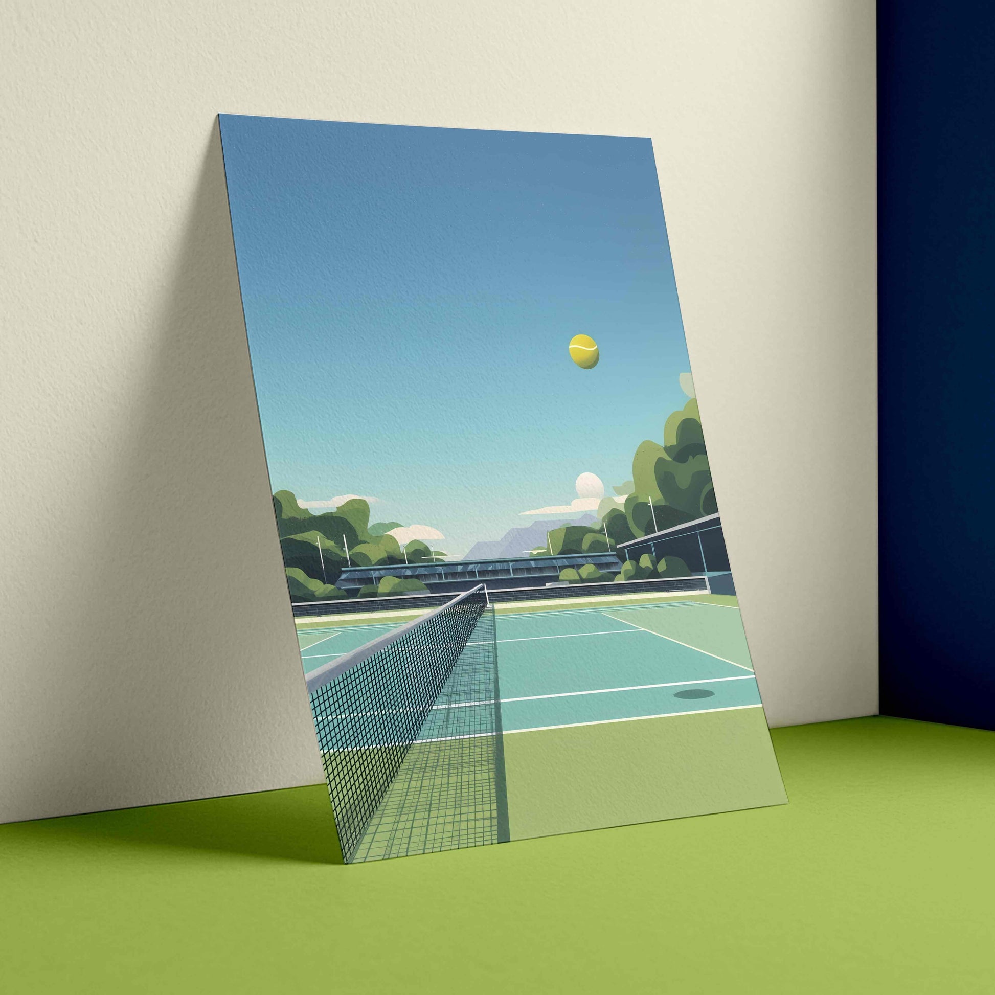 A vertical art print depicting a stylized tennis court scene with a yellow ball under a blue sky, leaning against a cream wall on a green floor.