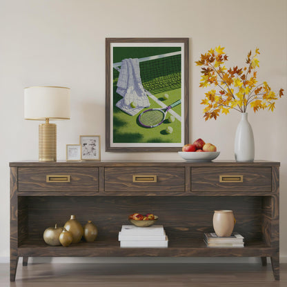 A dark brown wooden console table styled in a living room setting, featuring a framed tennis art print, a table lamp, decorative vases, books, and fruit bowls. Vintage tennis racket, towel and balls resting on a grass court, retro lilac and sage tennis wall art print