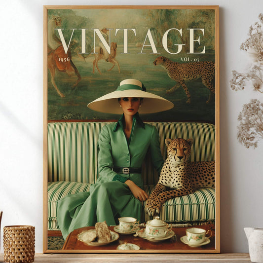 Vintage 1950s fashion editorial wall art print — elegant woman in sage green dress and wide-brimmed straw hat seated beside a reclining cheetah on a striped sofa, with an oil-painted African mural backdrop and fine china tea service