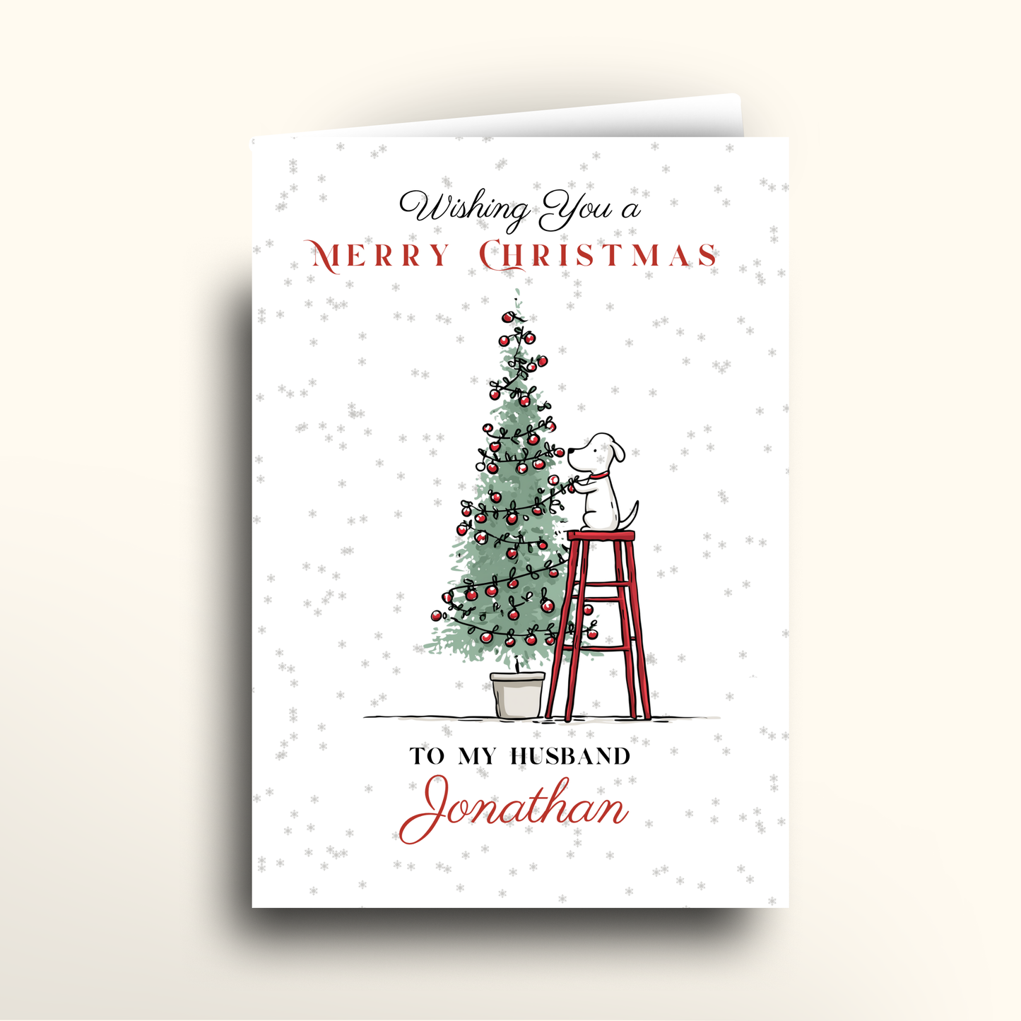 Christmas card with a dog on a ladder and Christmas tree, personalized for 'Jonathan'.