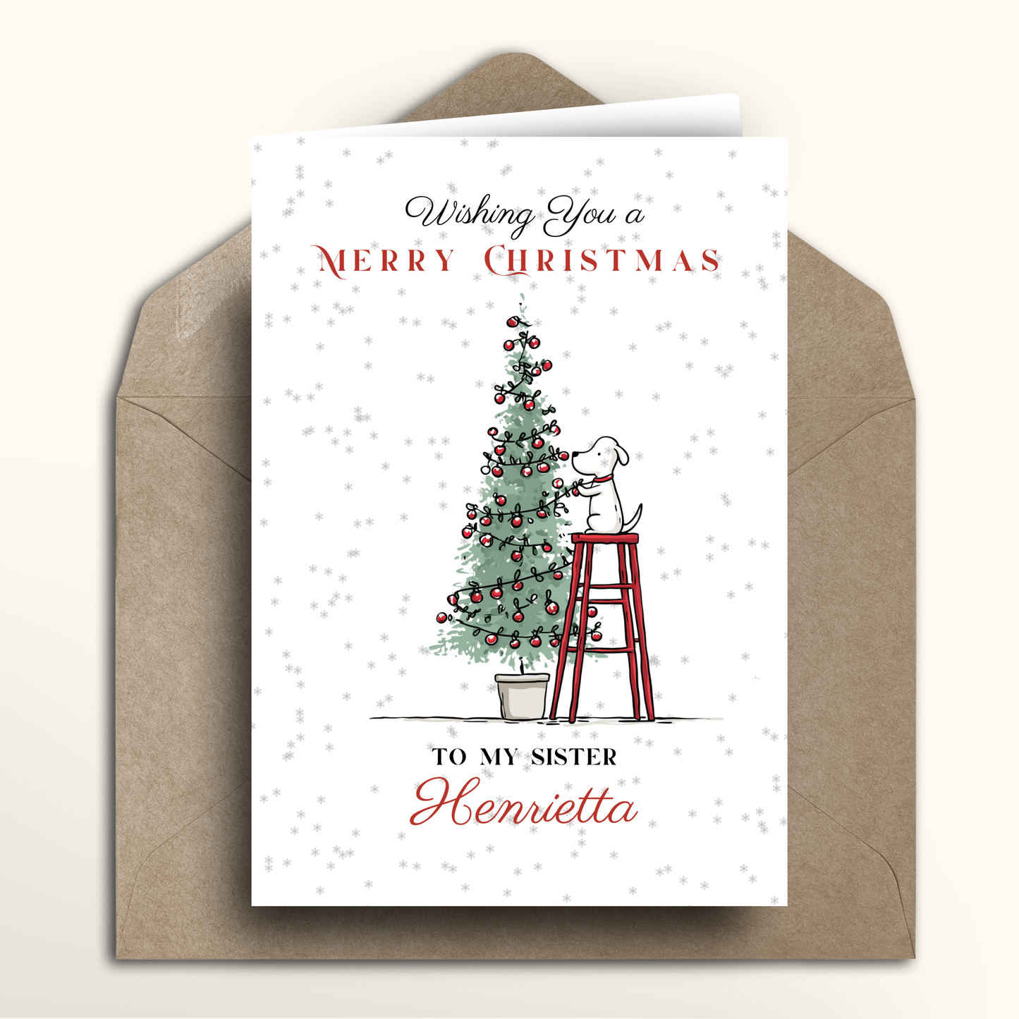 Christmas card with a dog on a stool by a decorated tree, inside a brown envelope.