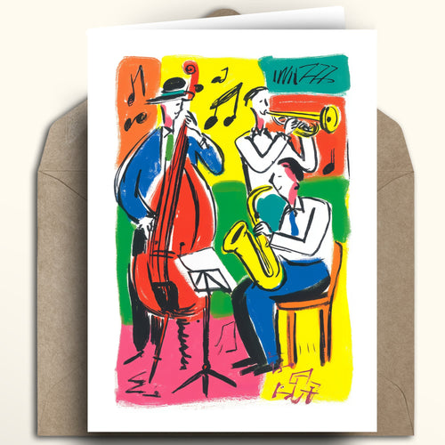 A greeting card featuring a colorful jazz musician illustration, displayed upright on top of a brown kraft envelope against a light beige background.