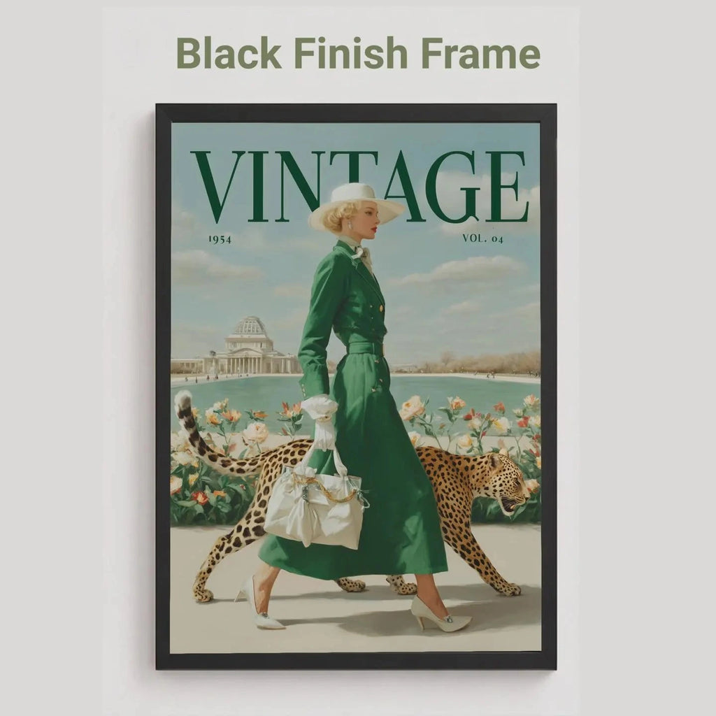 A framed vintage-style magazine cover art piece on a light gray background, with the text 'Black Finish Frame' above it. The artwork shows a woman in a green dress walking with a leopard, under a large 'VINTAGE' title, and the frame itself is black.