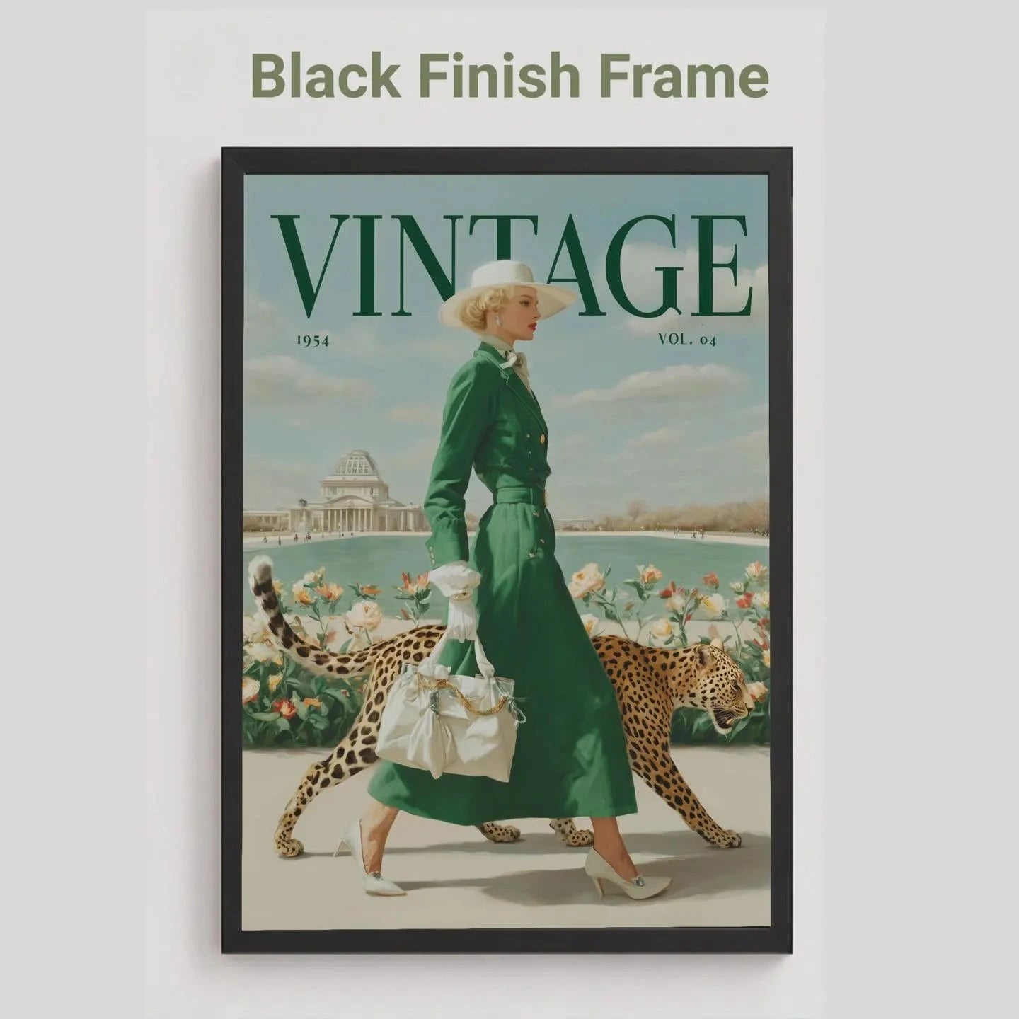 A framed vintage-style magazine cover art piece on a light gray background, with the text 'Black Finish Frame' above it. The artwork shows a woman in a green dress walking with a leopard, under a large 'VINTAGE' title, and the frame itself is black.