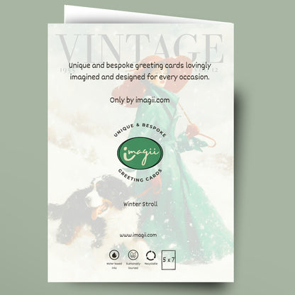 A greeting card mockup shown against a muted sage green background. The card features a vintage-style winter illustration with a woman in a flowing mint dress and a dog, overlaid with text including 'Vintage', 'Unique and bespoke greeting cards lovingly imagined and designed for every occasion.