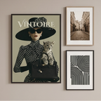 A collage of six interior scenes showing framed fashion posters featuring a woman in a black hat and coat with the word VINTOIRE. The posters are displayed in different rooms with furniture, lamps, plants, and wall decor.