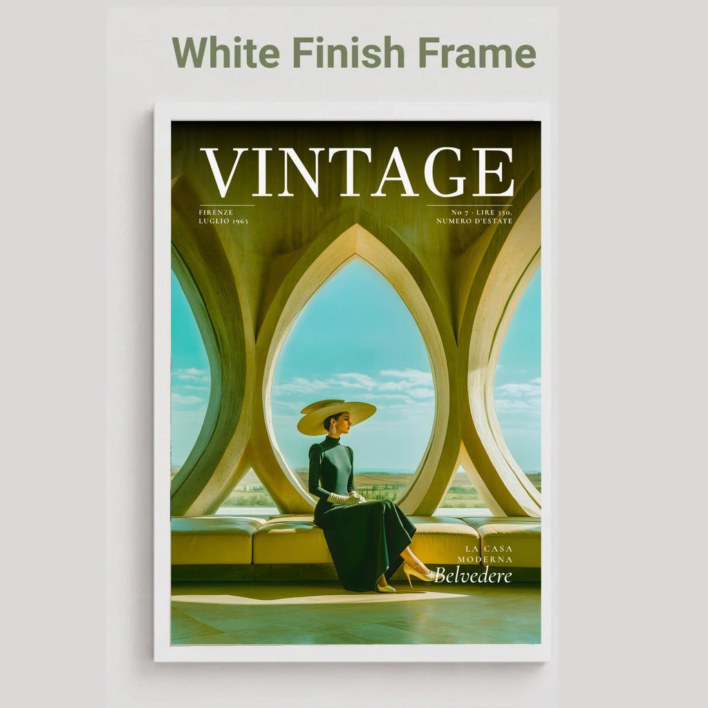 A vintage-style framed poster or magazine cover featuring the word VINTAGE at the top and an illustrated seated woman viewed through large arched windows. The frame is white, and the image is shown against a light gray background with the text 'White Finish Frame' above.