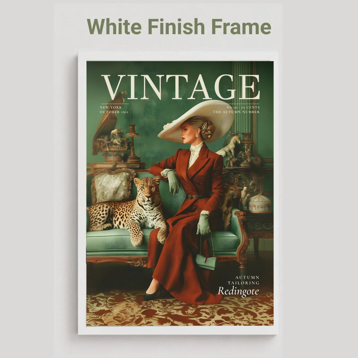 A vintage-style framed art print featuring a woman in a red coat and wide-brimmed hat seated on a teal sofa with a leopard beside her, under the large word 'VINTAGE.' The frame is white, and the image is shown against a light gray background with the text 'White Finish Frame' above it.