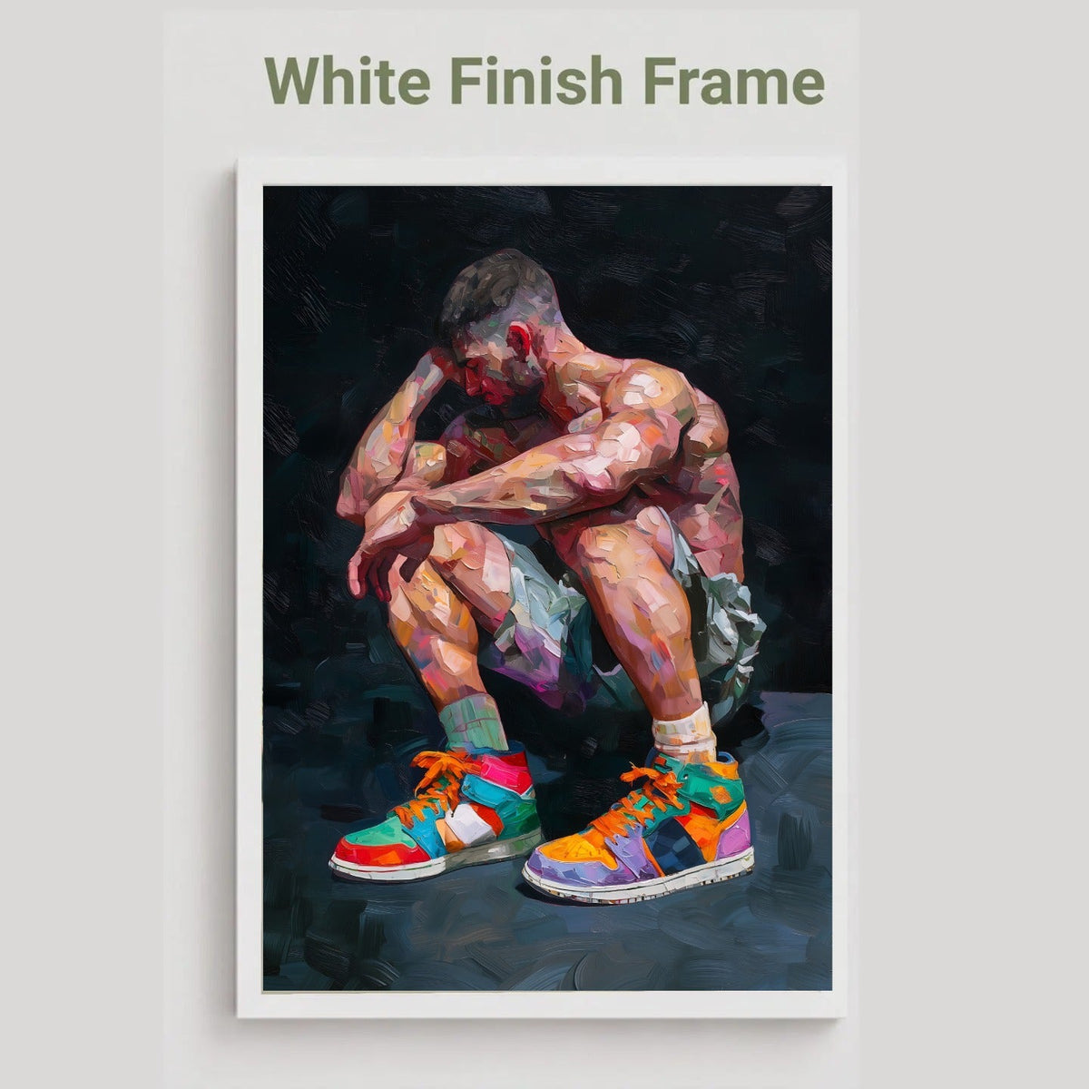 Pause gay art print in the white finish frame option, a muscular man crouching in colourful high-top trainers, labelled White Finish Frame