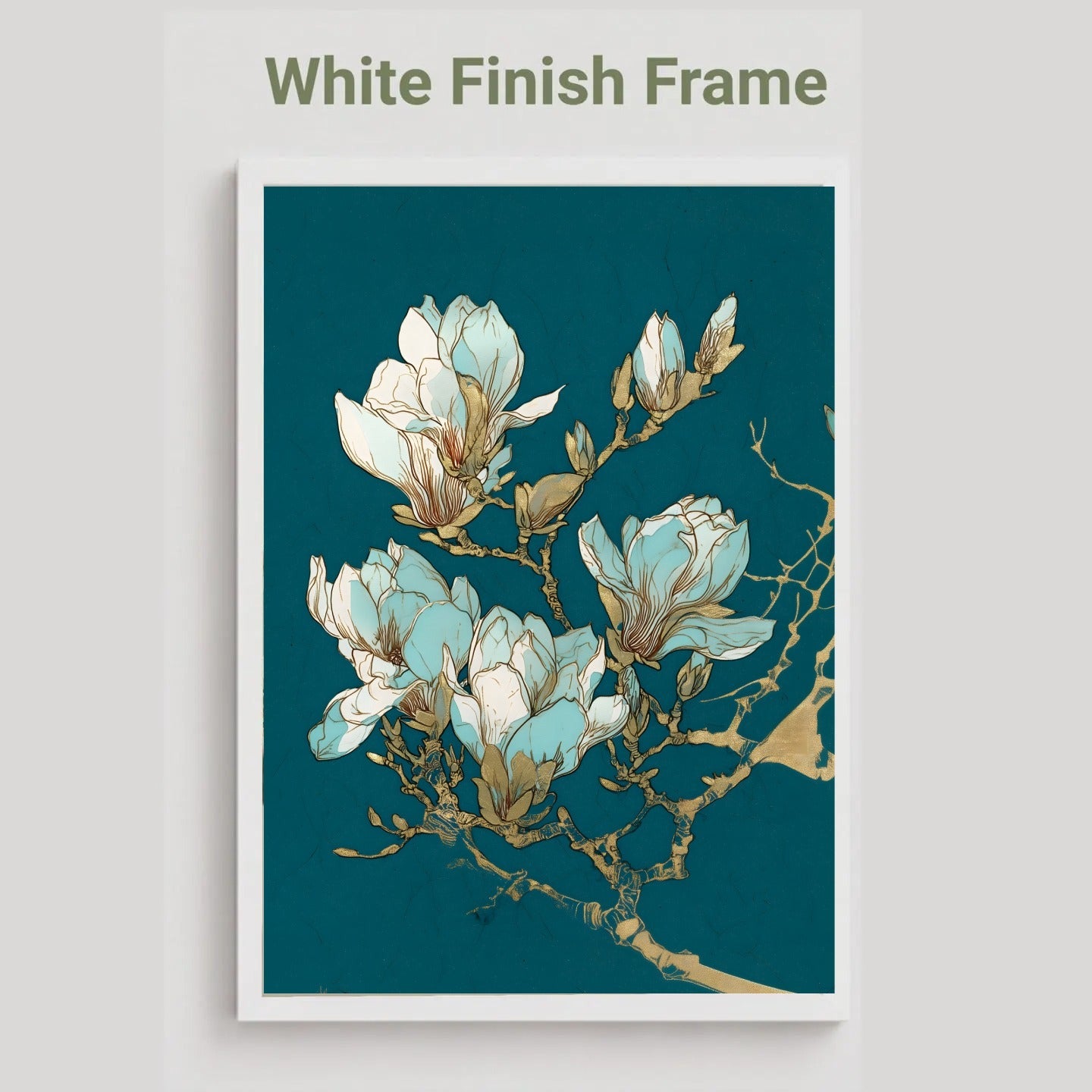 A framed floral art print featuring light blue and white magnolia blossoms on a dark teal background, shown with a white frame and the text 'White Finish Frame' above it.