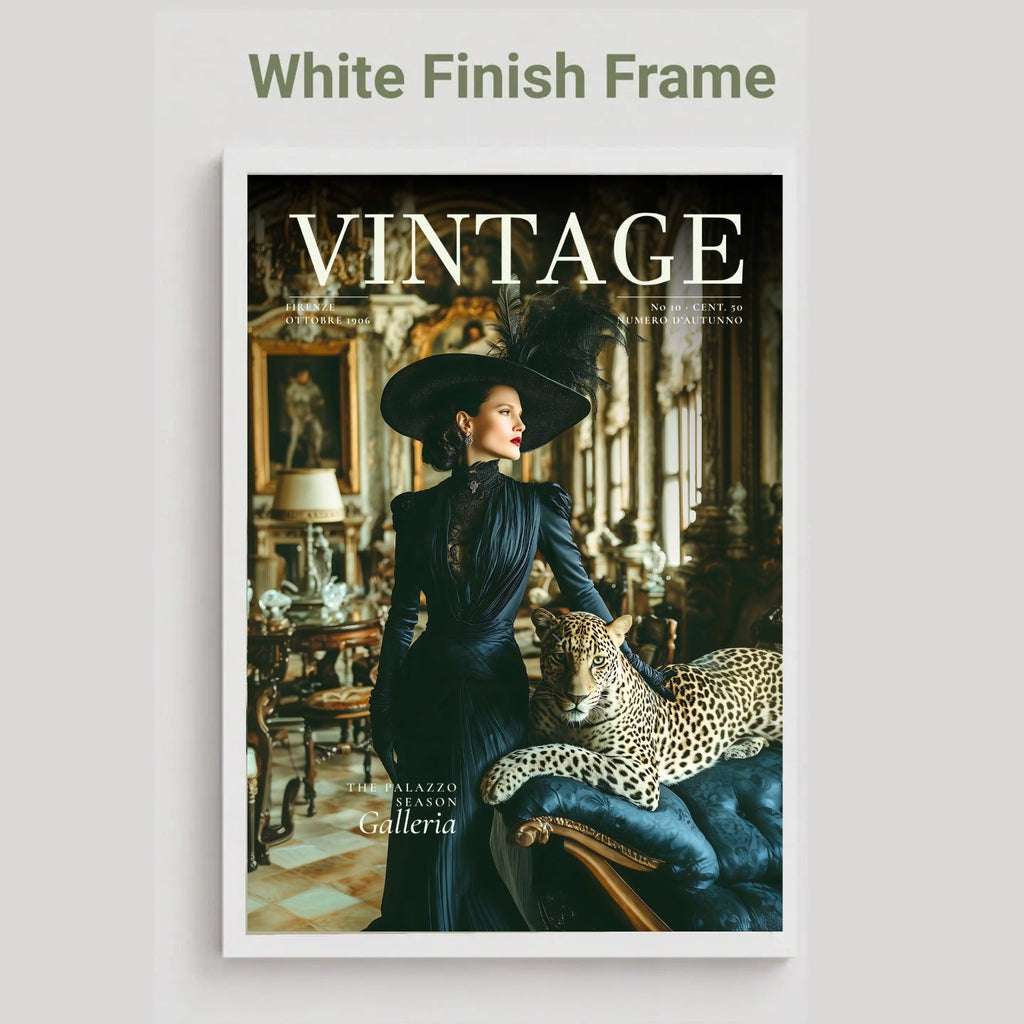 A framed art print featuring the cover of Vintage magazine, styled with a white frame and displayed against a neutral gray background. The cover shows a woman in a dark blue Victorian-style dress and hat with a leopard on a blue velvet chaise lounge.