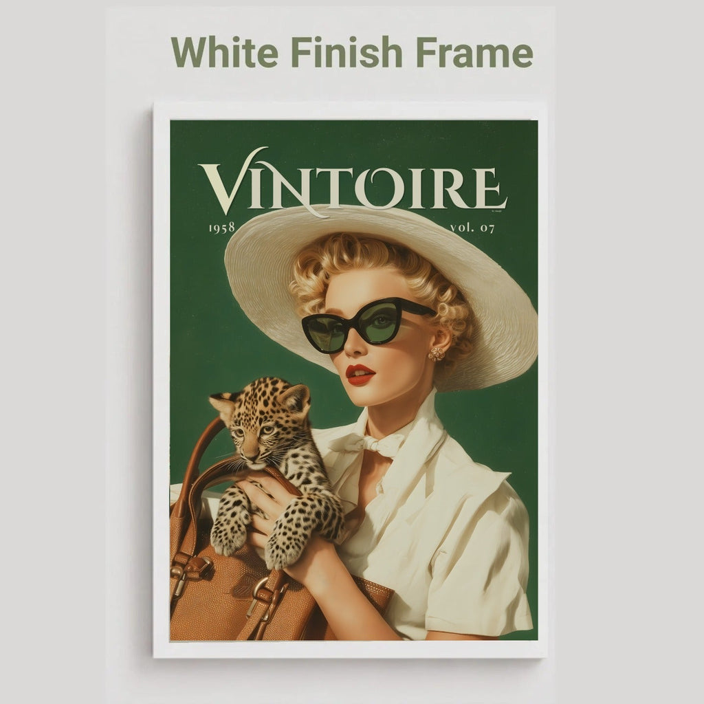 A vintage-style poster or print with a white frame, featuring a woman in a wide-brim hat and sunglasses holding a leopard, with the title 'VINTOIRE' at the top. The image is shown on a light gray background with the text 'White Finish Frame' above it. Retro leopard wall art poster: 1950s woman in cat-eye sunglasses holding a leopard cub, green vintage print for maximalist decor
