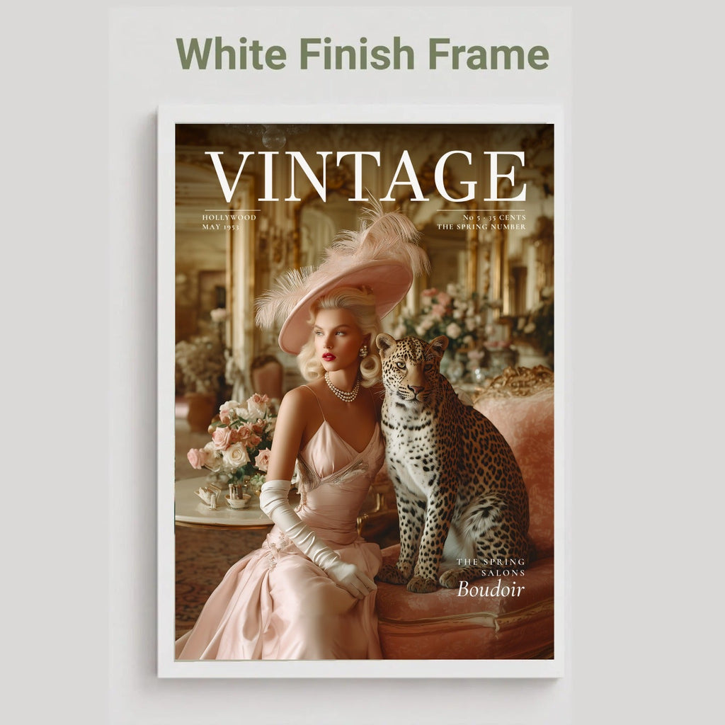 A framed art print featuring a vintage cover design with the title 'VINTAGE' and a woman in a pale pink gown seated beside a leopard, shown against a light gray background with the text 'White Finish Frame' above it.