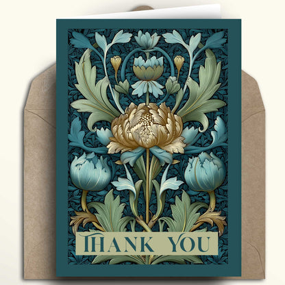 A square floral thank you card with an Art Nouveau design, featuring a large central cream flower and blue-green foliage on a dark teal background, shown with a brown kraft envelope behind it.