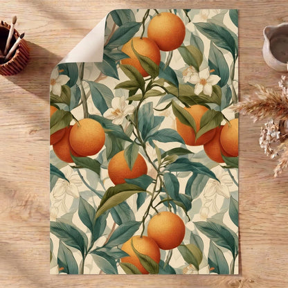 poster with orange and leaf pattern on a wooden table, william morris 