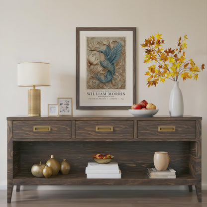 Willam Morris Exhibition Style - Wooden console table with decorative items including a lamp, framed artwork, and vases.