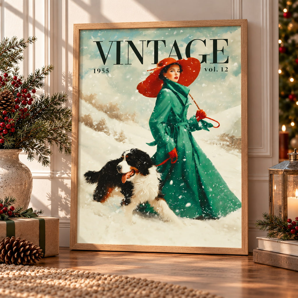 A framed vintage-style holiday art print leaning against a wall in a decorated room. The print shows a woman in a green coat and red hat walking a black-and-white dog through snow, with the text 'VINTAGE 1955 vol.