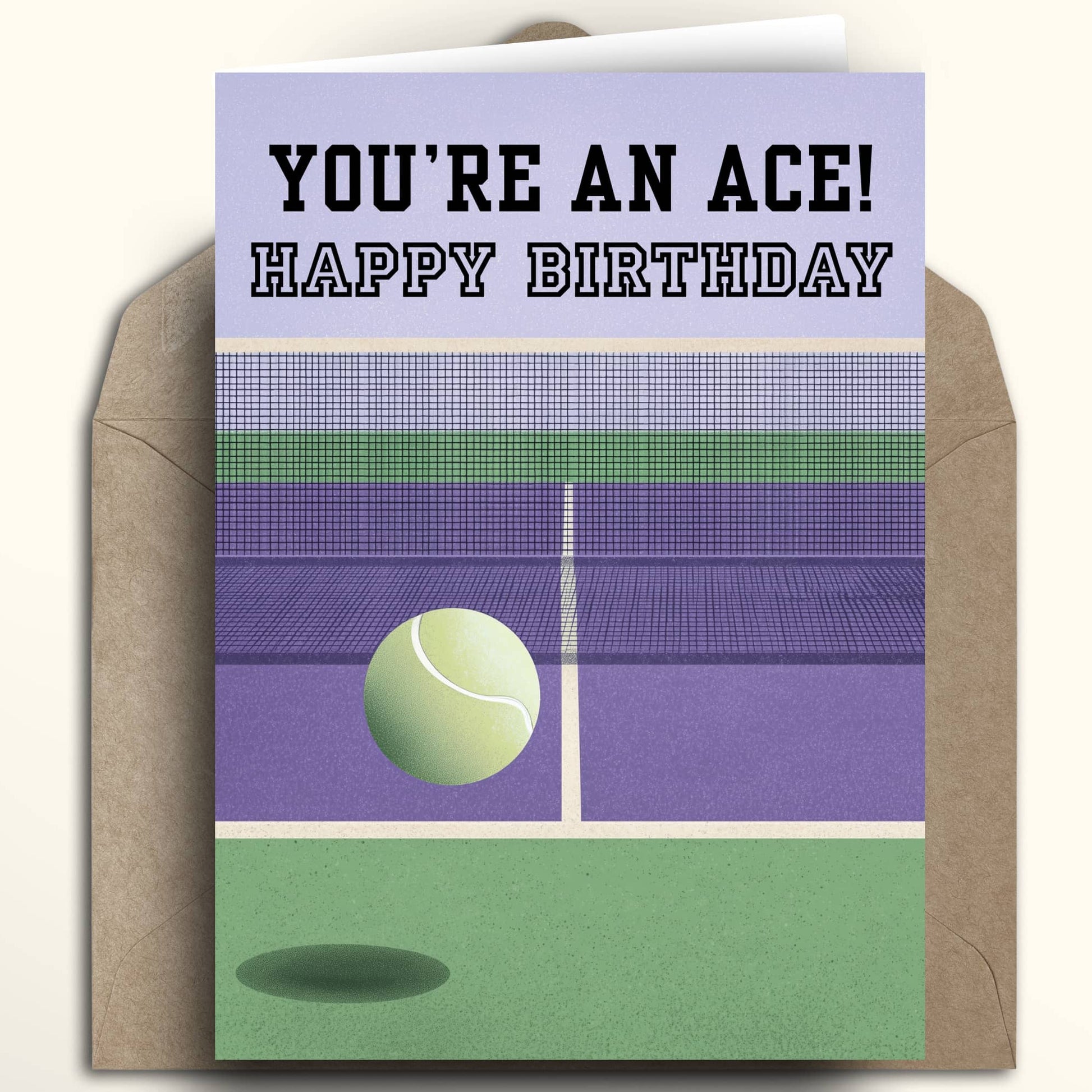A tennis-themed birthday card with a kraft envelope behind it. The card reads 'YOU'RE AN ACE! HAPPY BIRTHDAY' above an illustrated purple and green tennis court with a tennis ball.