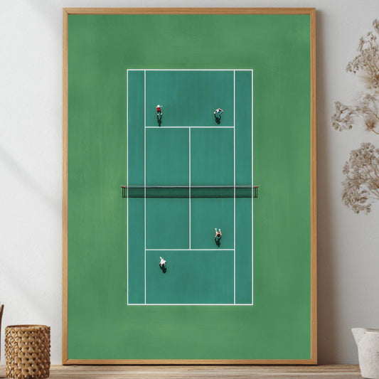 Framed artwork of a tennis court in miniature from above on a wall with decorative elements.