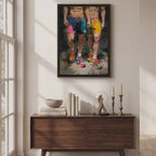 Video of the Two of a Kind gay couple print in a black frame hanging above a wooden sideboard in a sunlit room, two men in colourful shorts and trainers