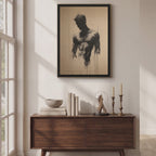 Video of the Bare Masculinity male figure print in a black frame on a sunlit cream wall above a walnut sideboard with candlesticks and books.