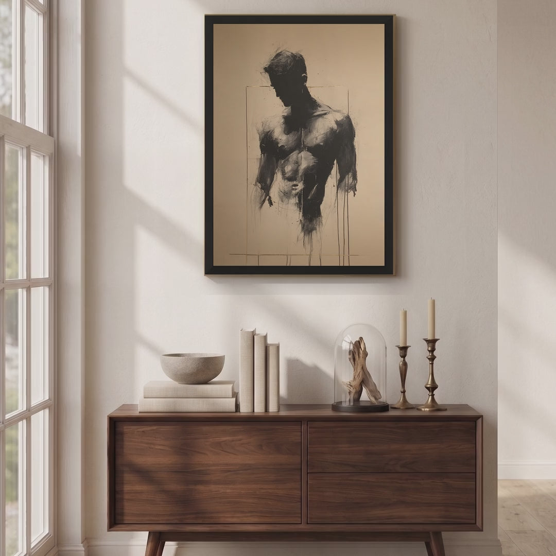 Video of the Bare Masculinity male figure print in a black frame on a sunlit cream wall above a walnut sideboard with candlesticks and books.