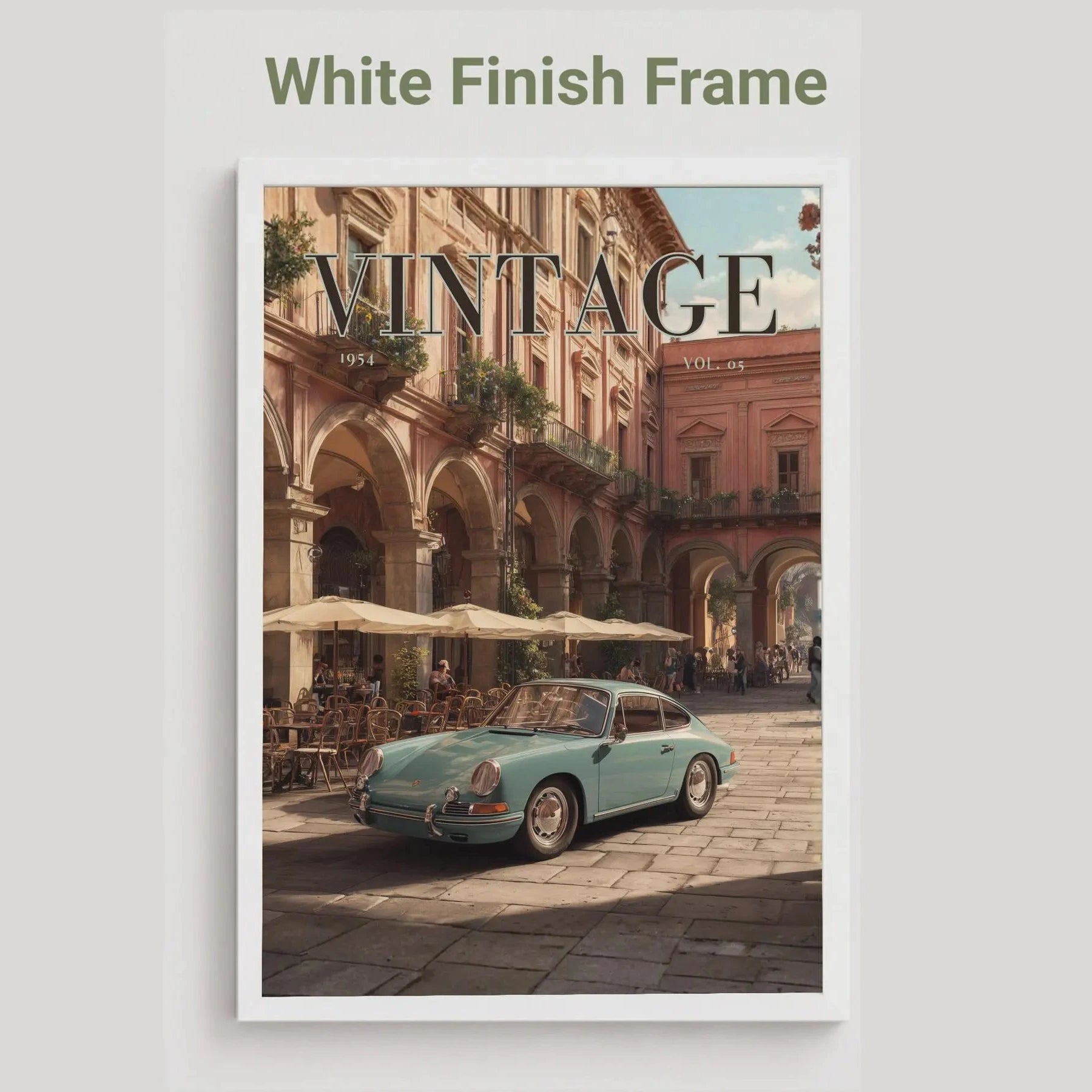 Framed artwork of a vintage car in an urban setting with 'Vintage' text.Vintage 1950s Porsche 911 classic car poster in a black frame on a white living room wall